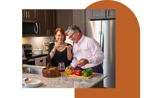 a man and a woman in a kitchen