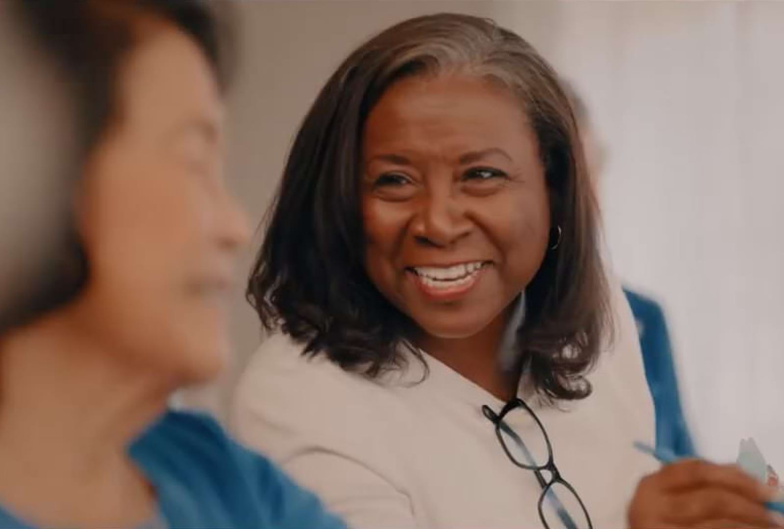 two women smiling
